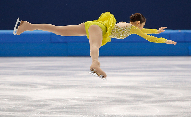 Illustration for article titled Amazing Images of Olympic Figure Skaters Defying Gravity
